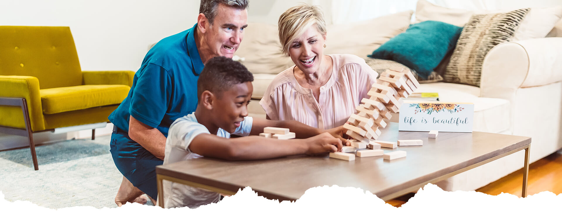 Family Members Playing Jenga Game