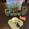 A Board Game of a Catapult Castle Theme